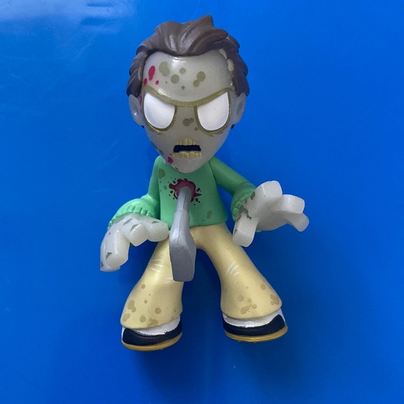 The walking dead glow in the dark zombi Funko mystery mini